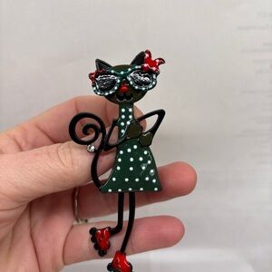 Vtg Roller Skating Green and Red Cat Brooch